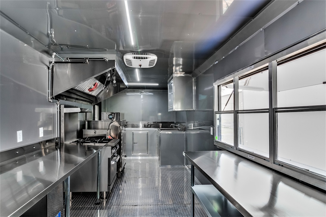 Stainless kitchen interior of a Custom Trailer Pros food trailer